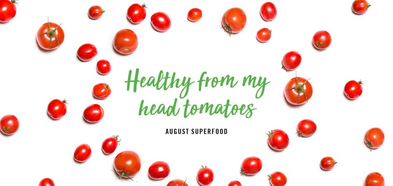 Red tomatoes scattered around the text "Healthy from my head tomatoes" and "August Superfood" on a white background.